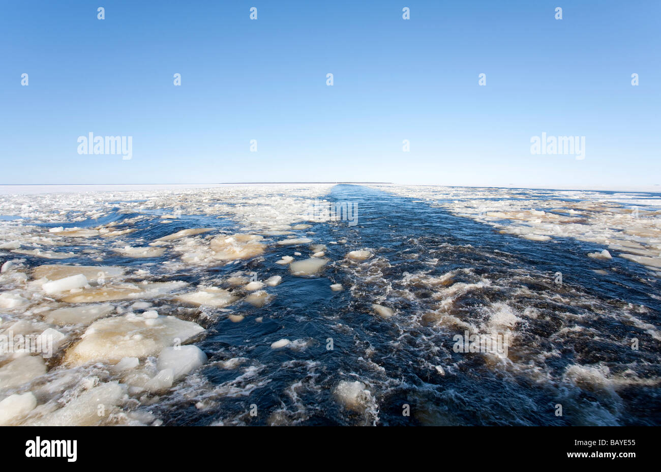 Breaking ice on ship's wake at Baltic Sea , traveling from Hailuoto Island at Gulf of Bothnia , Finland Stock Photo