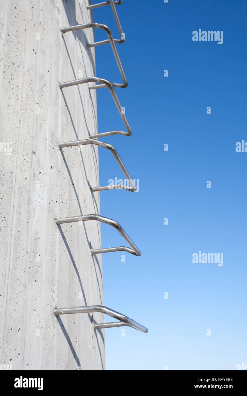Steel ladders embedded cast directly to concrete wall Stock Photo Alamy
