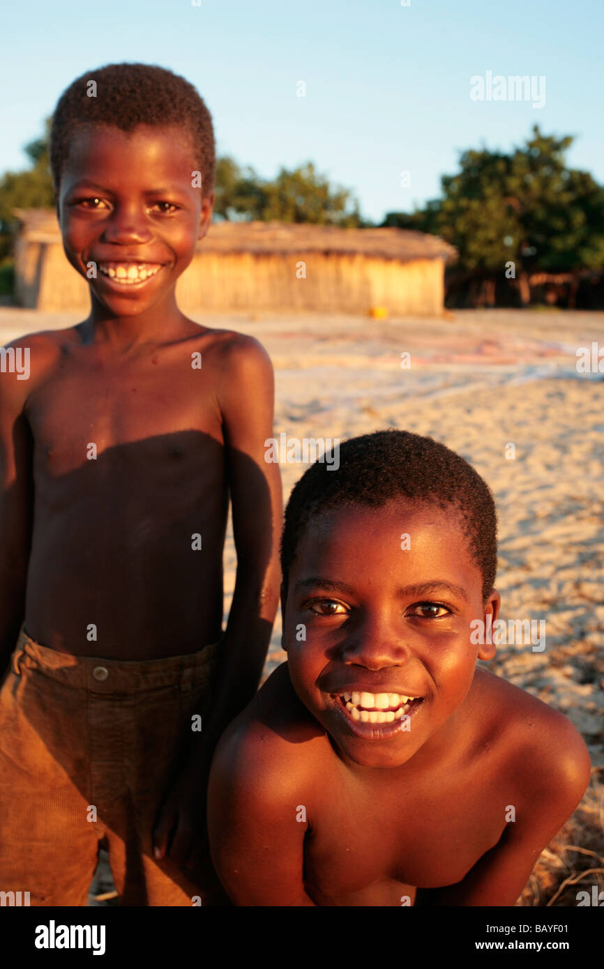 Two smiling village boys in a lakeside village in Malawi Stock Photo