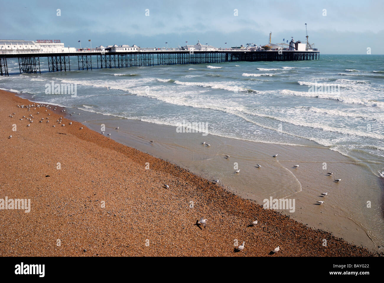 Brighton Pier with beach at low tide in foreground Stock Photo