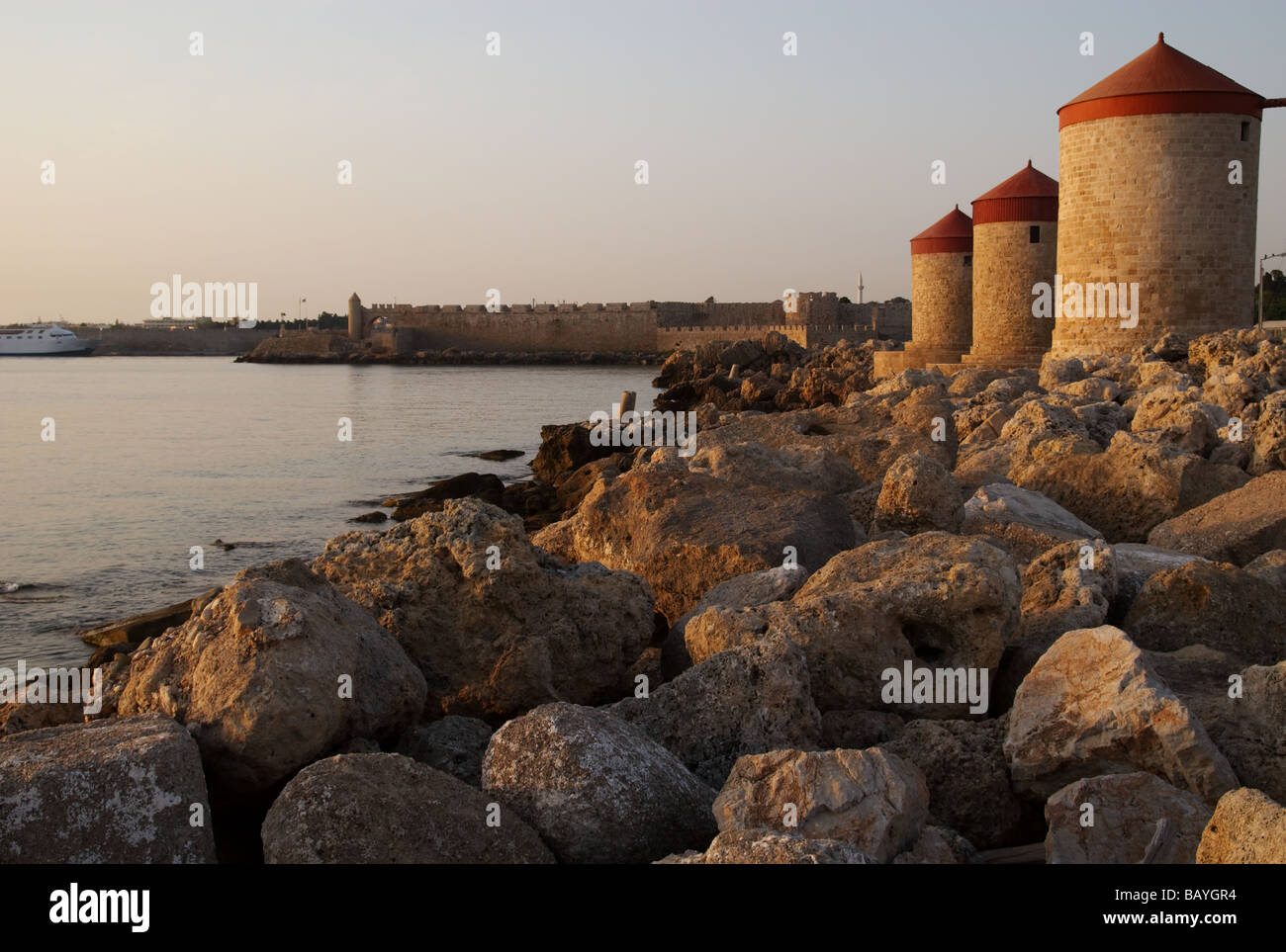 The Moles bases of Medieval Windmills Rhodes Greece captured at sunrise