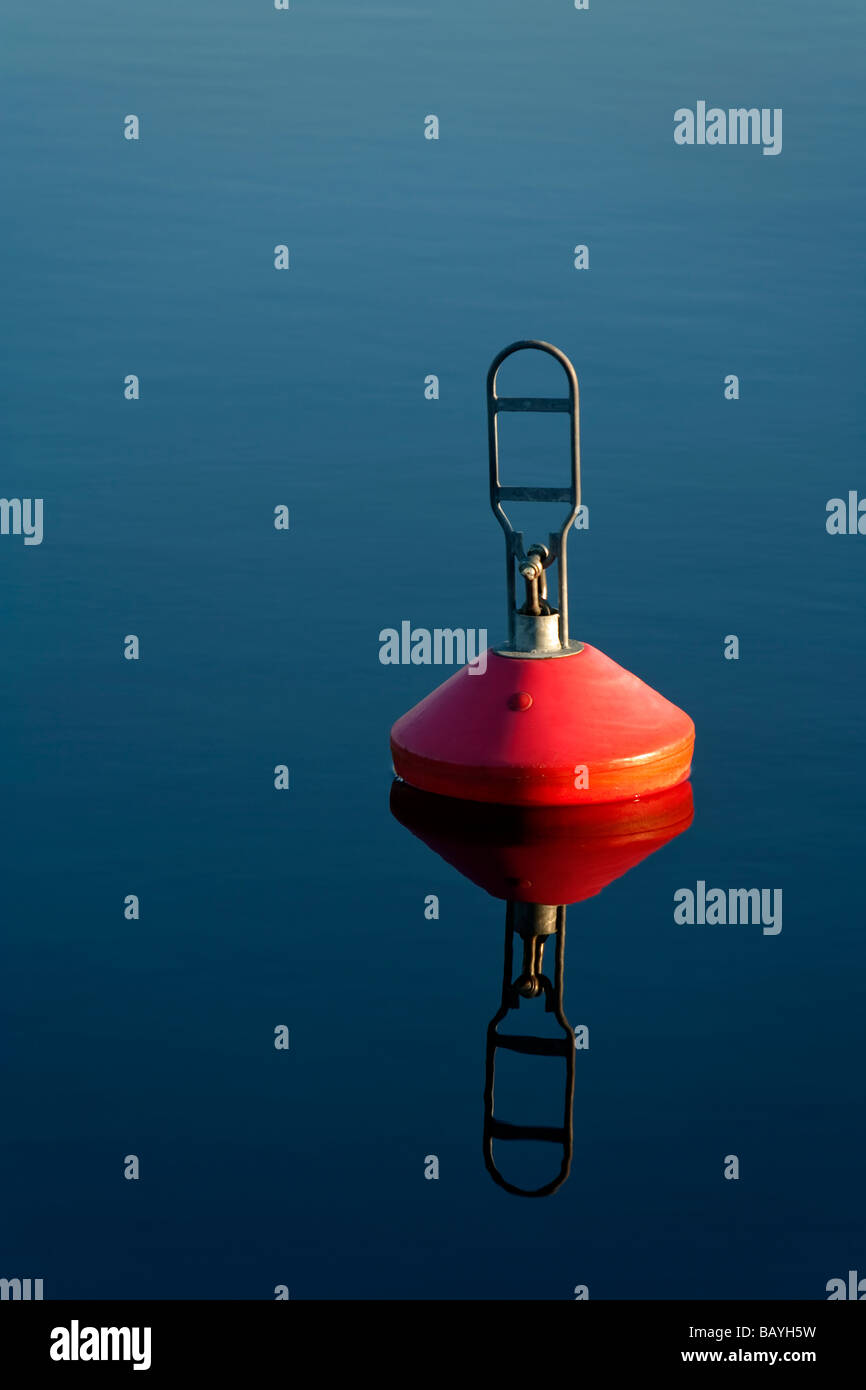 Red buoy on water Stock Photo Alamy