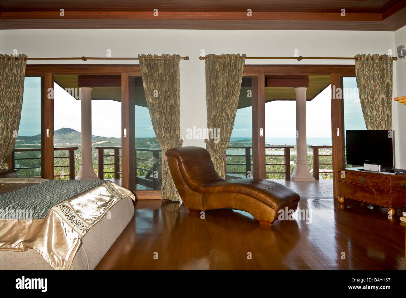 Luxury bedroom interior and balcony with 360 degree panoramic views of ...