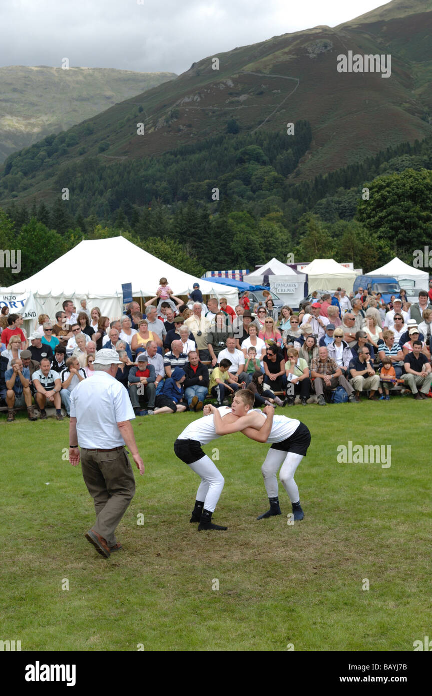 Cumberland Wrestling at Grasmere sports which is a traditional country sports in Cumbria. Stock Photo