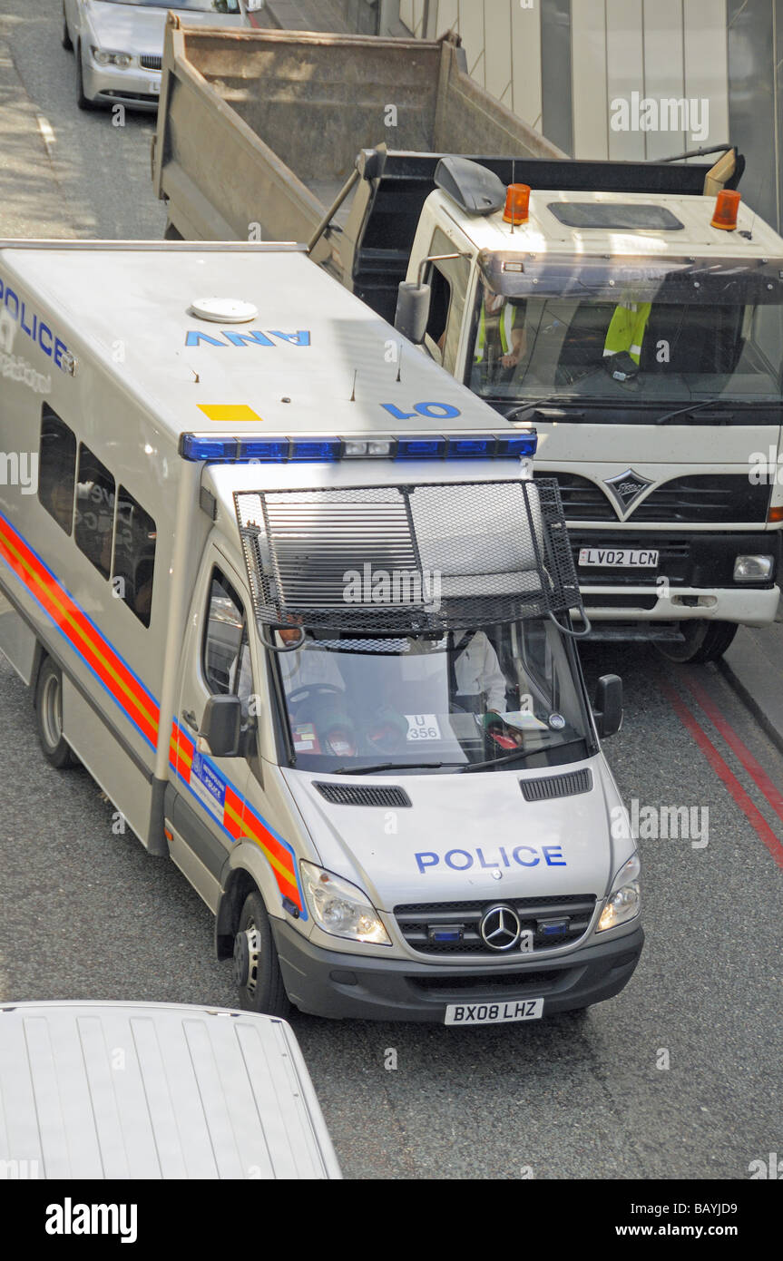 Police van in traffic from above just about to enter the Euston Road underpass London England UK Stock Photo