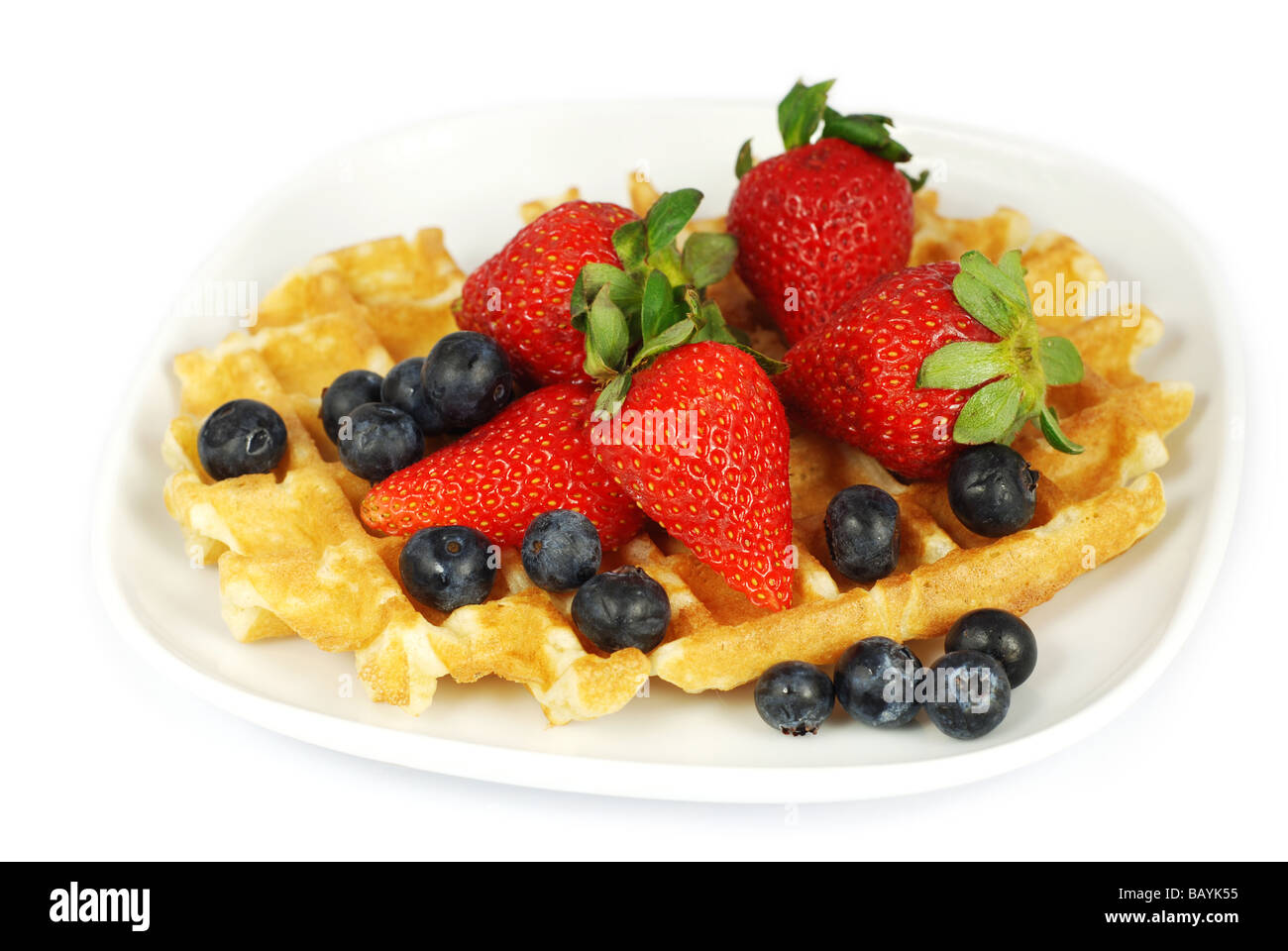 Plate of waffles with berries Stock Photo