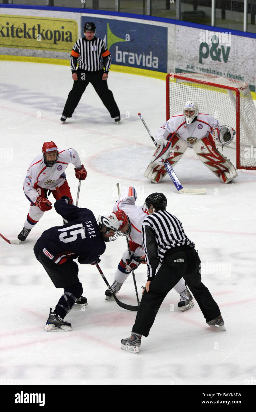Face Off In A U18 Ice Hockey Game Between Usa And Russia Us No 15 Is Drew Shore Stock Photo Alamy