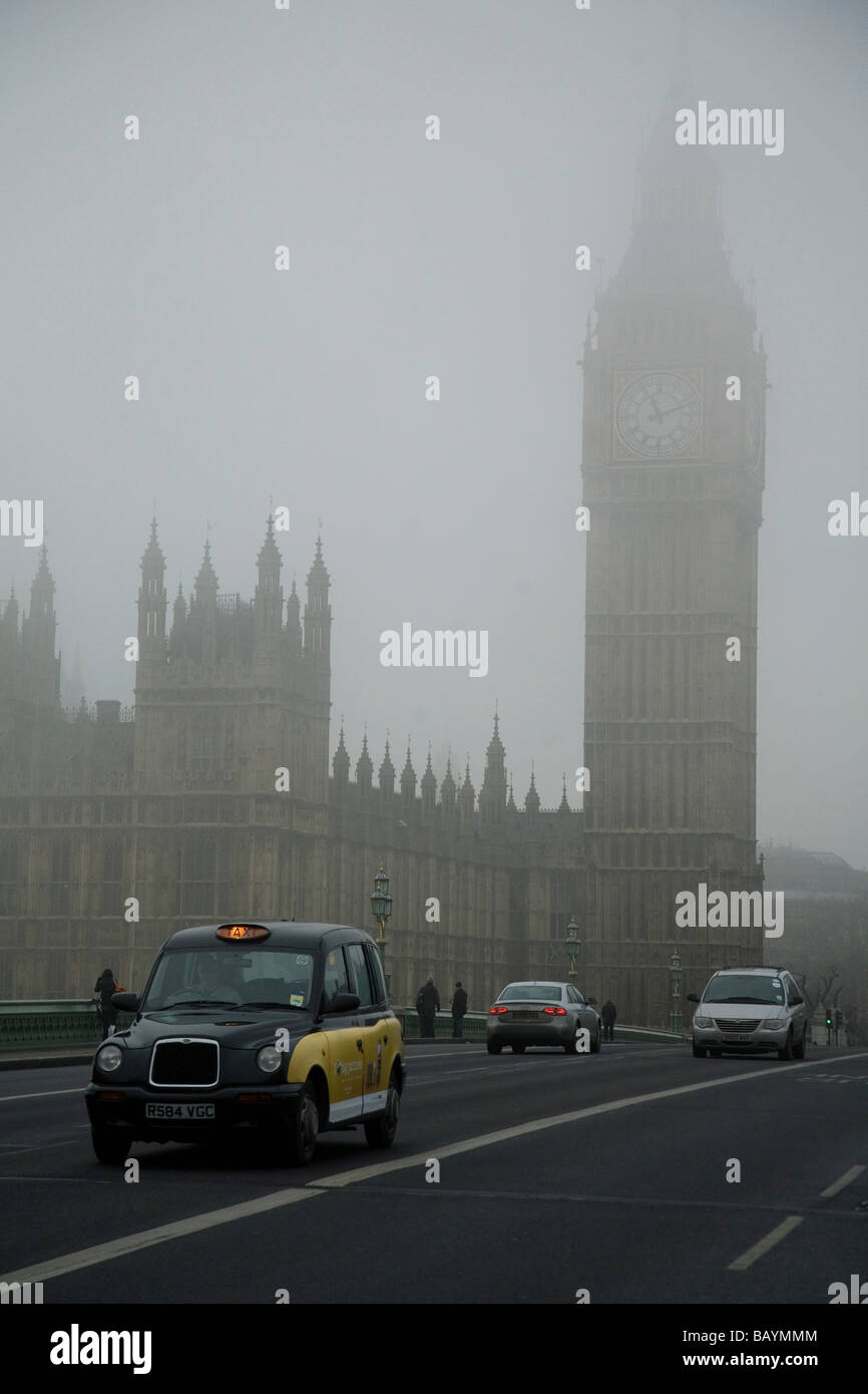 Big Ben and Westminster Bridge in thick fog on a January winter's day ...