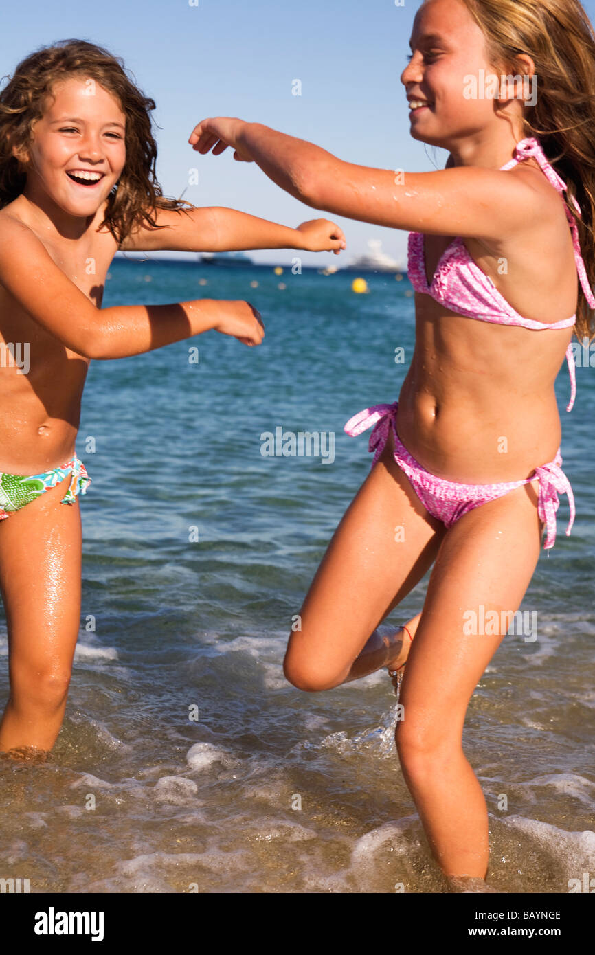 Pretty children playing and having fun on the beach. Plage de Pampelonne, Ramatuelle, St Tropez, France Stock Photo
