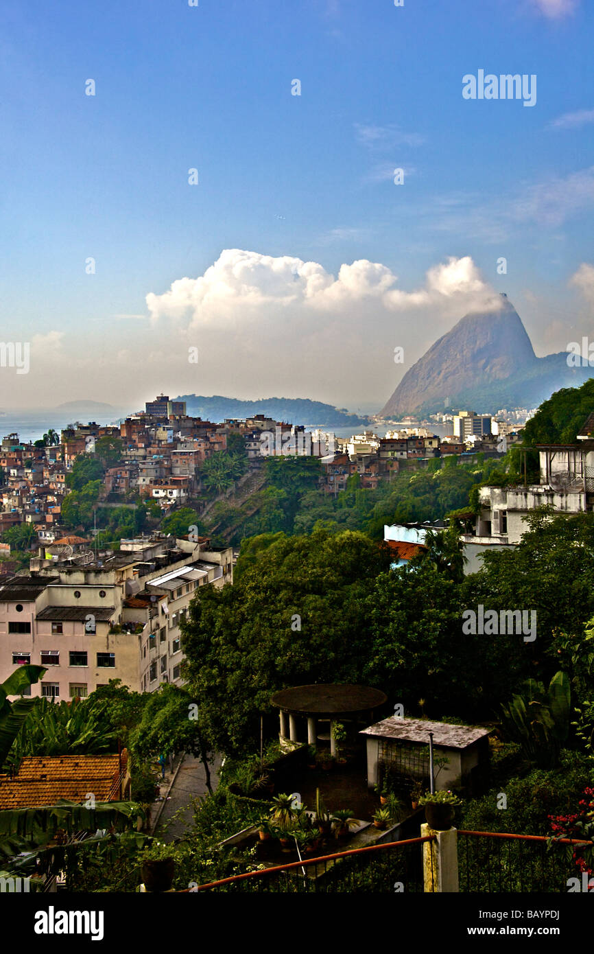 Rio de Janeiro Sugarloaf Mountain with Favela Santo Amaro shantytown Stock Photo