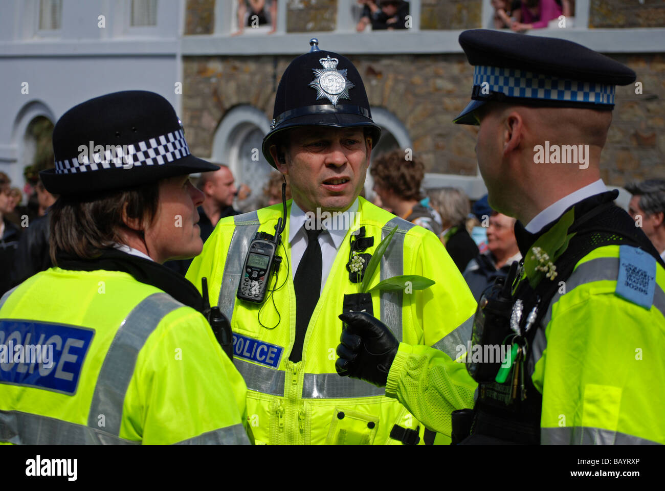 british police on crowd control duty at the helston flora day,helston,cornwall,uk Stock Photo