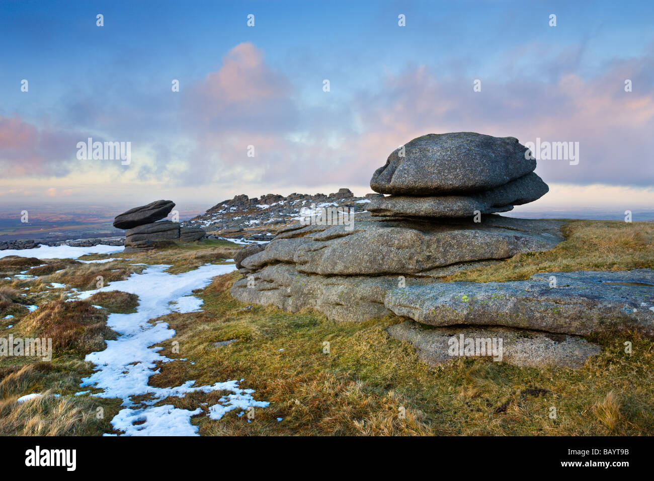 Melting snow on Belstone Tor Dartmoor National Park Devon England February 2009 Stock Photo