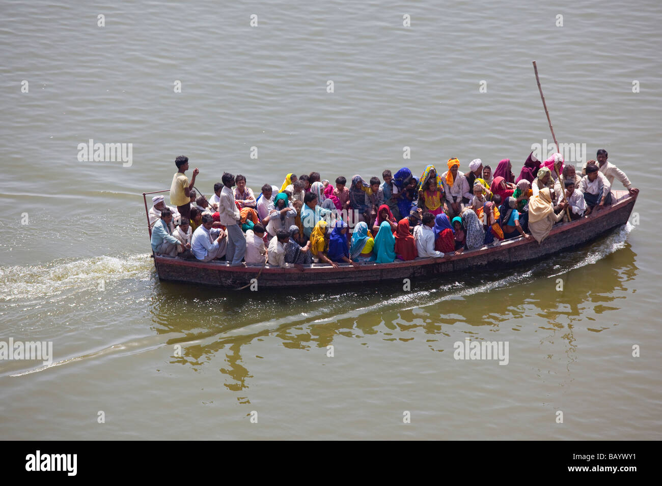 Indian People in a Boat on the Ganga River in Varanasi India Stock Photo