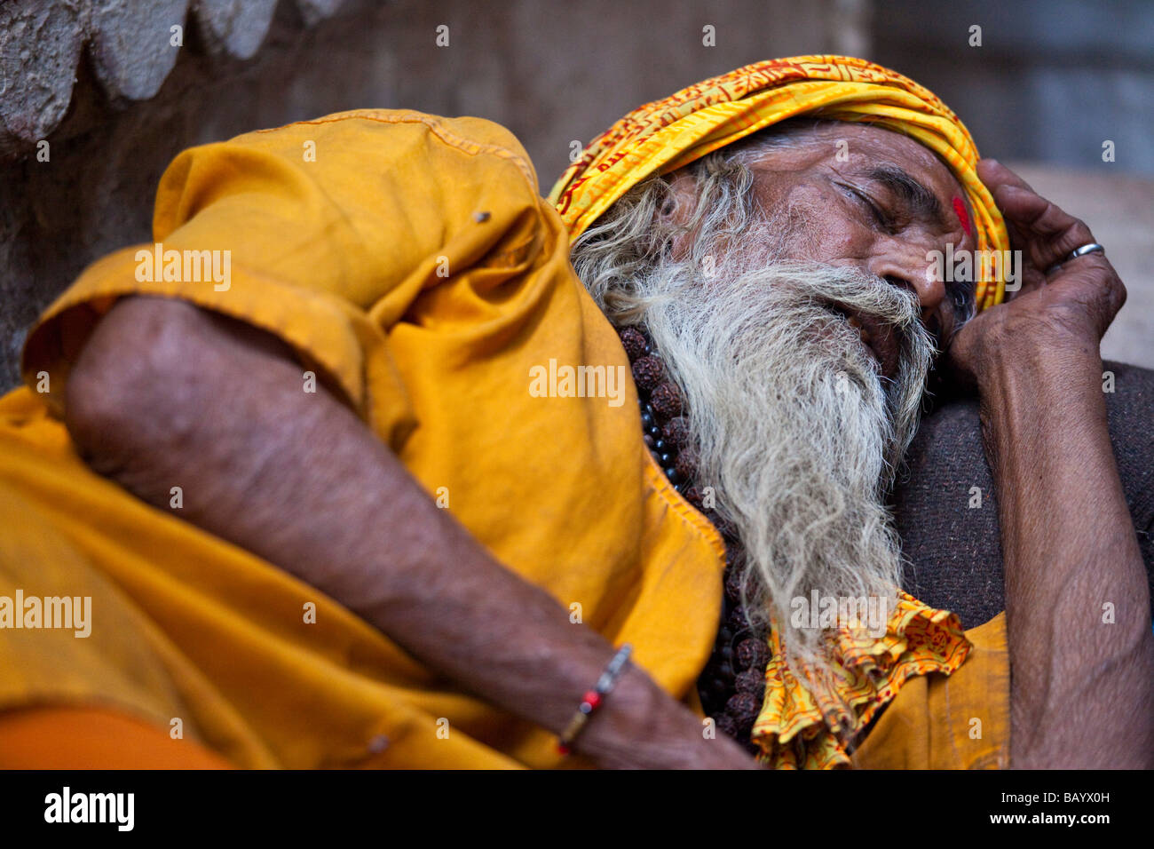 Sadhu Sleeping in Varanasi India Stock Photo