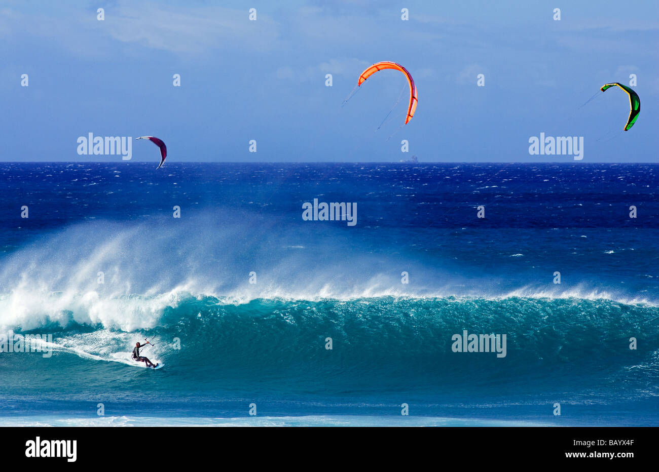 Kiteboarding at Ho'okipa Beach, Maui, Hawaii. Kiteboarding has