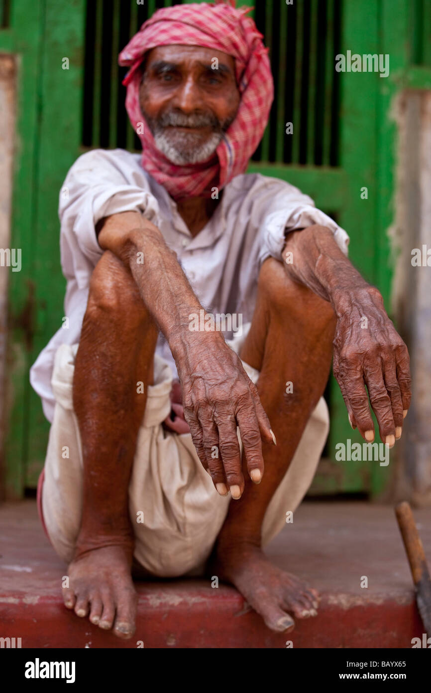 Worn Hands of an Aging Indian Man in Varanasi India Stock Photo