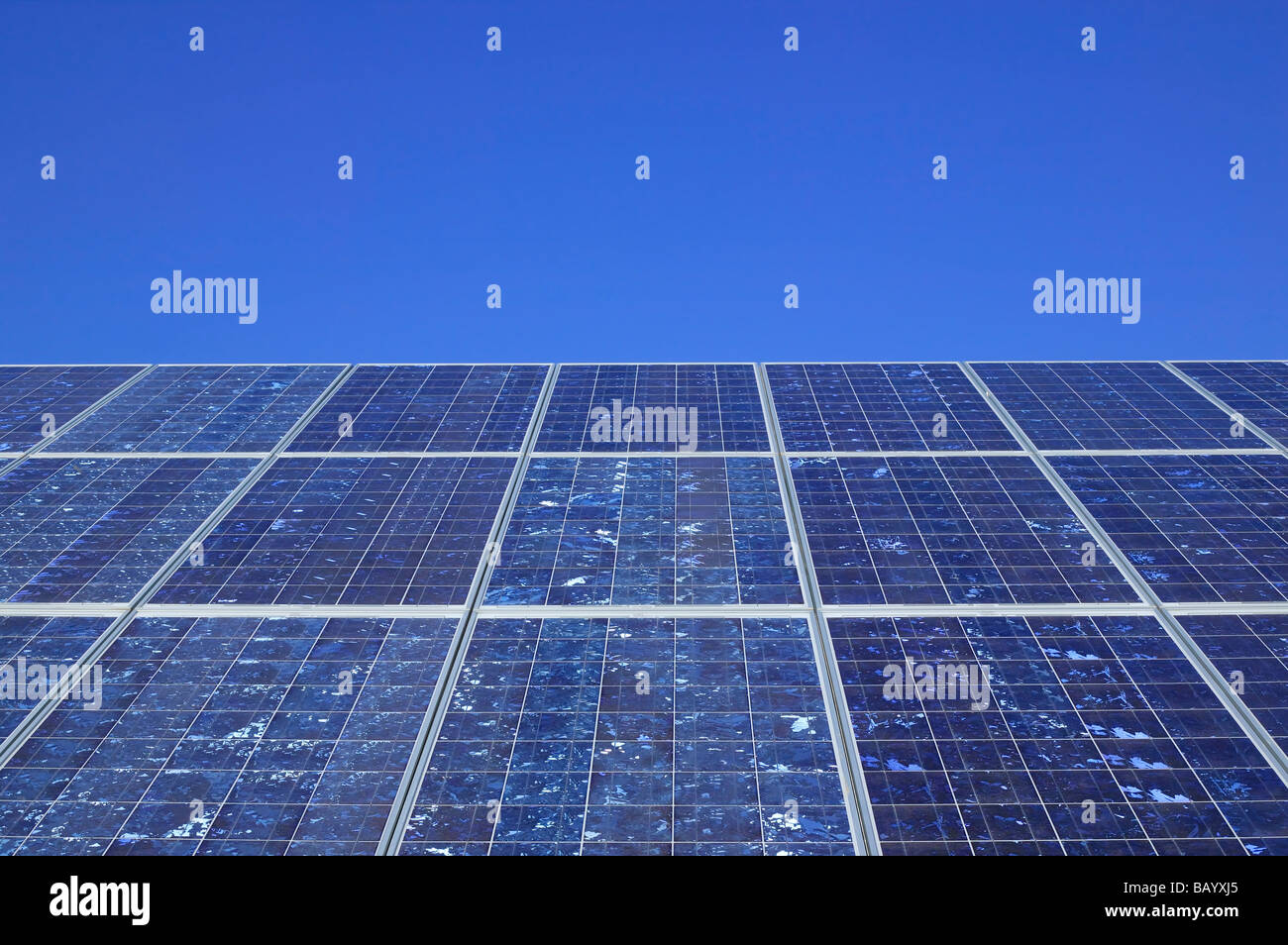 huge silicon solar panel with blue sky Stock Photo