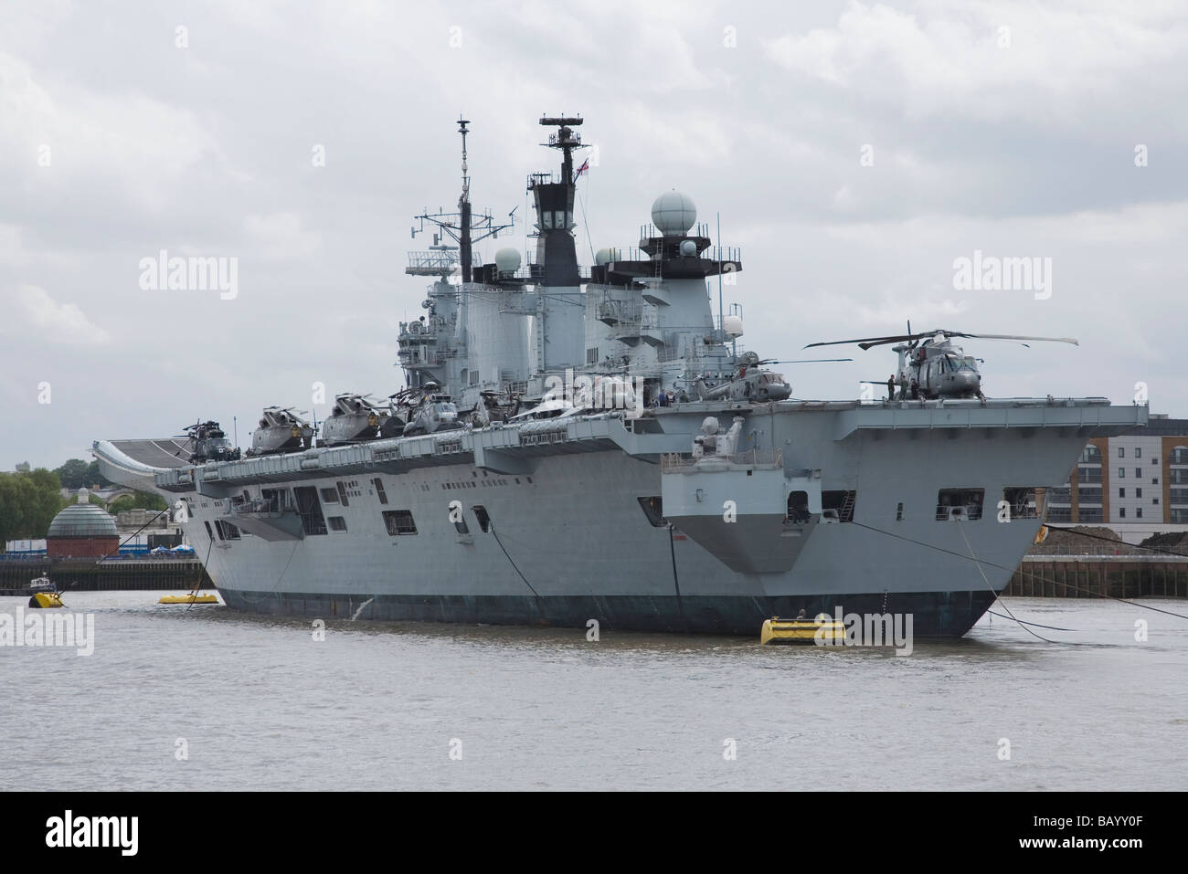 LONDON, ENGLAND - MAY 09: HMS Illustrious, the UK's strike aircraft carrier, moored on the river Thames at Greenwich. Stock Photo