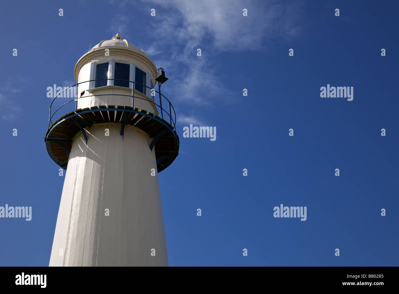 Lighthouse against a blue sky close up UK Stock Photo