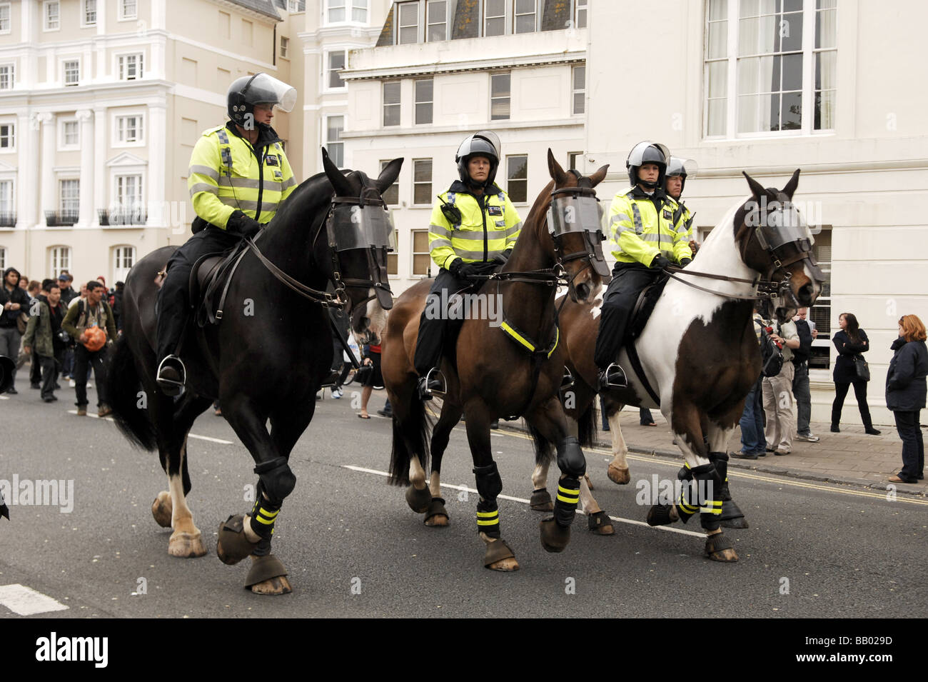 Police on horseback on duty at the Mayday Protests in Brighton UK Stock Photo
