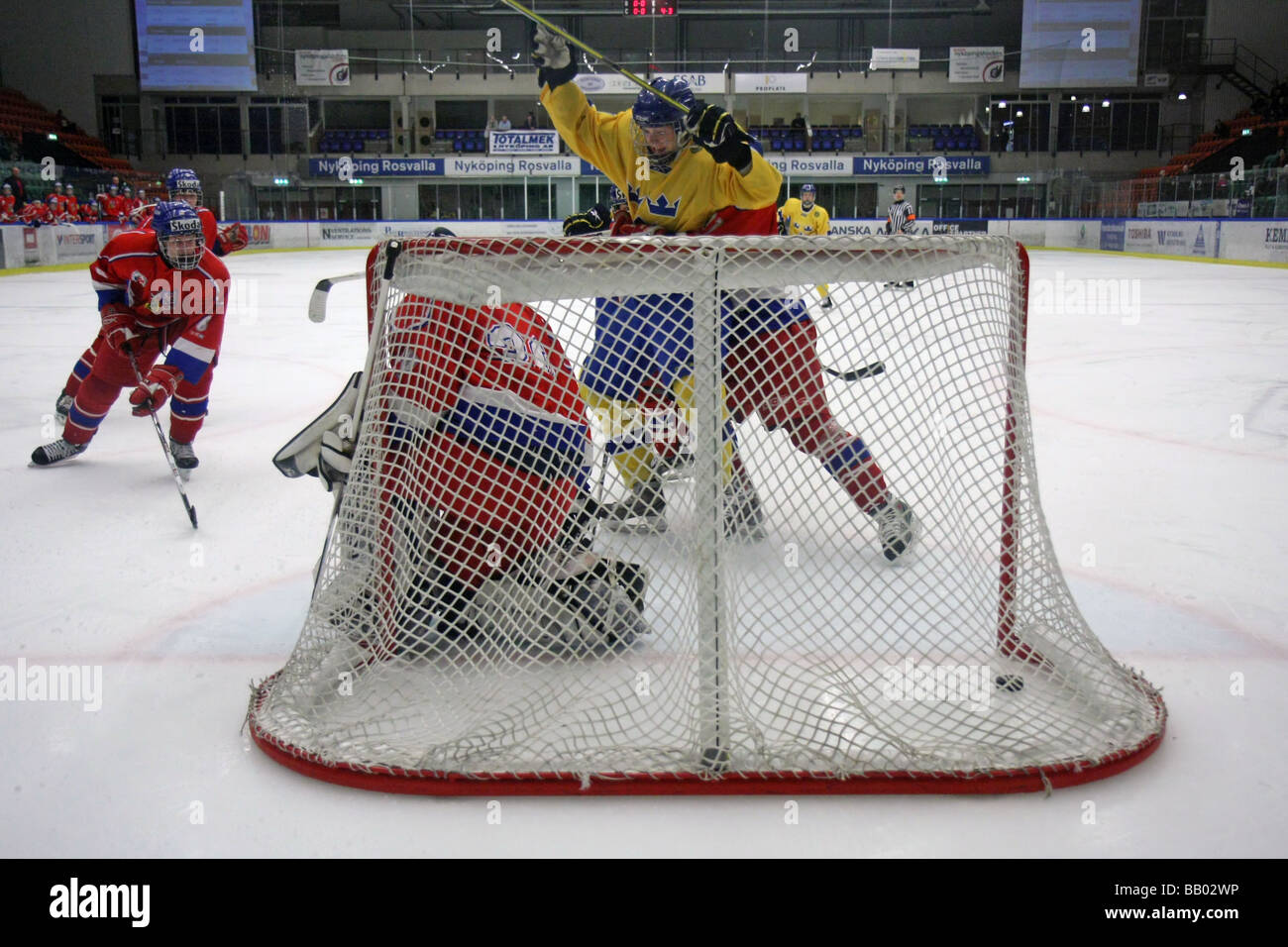 Ice hockey players behind hi-res stock photography and images