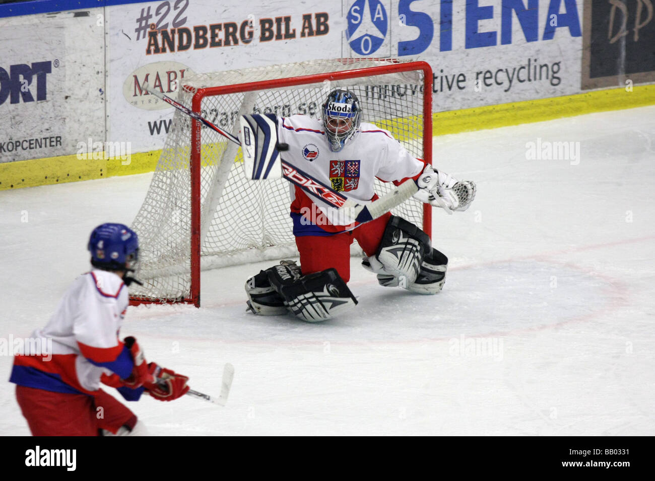 Czech goalkeeper no 1 Petr Mrázek making a save in a U18 ice-hockey tournament. Stock Photo