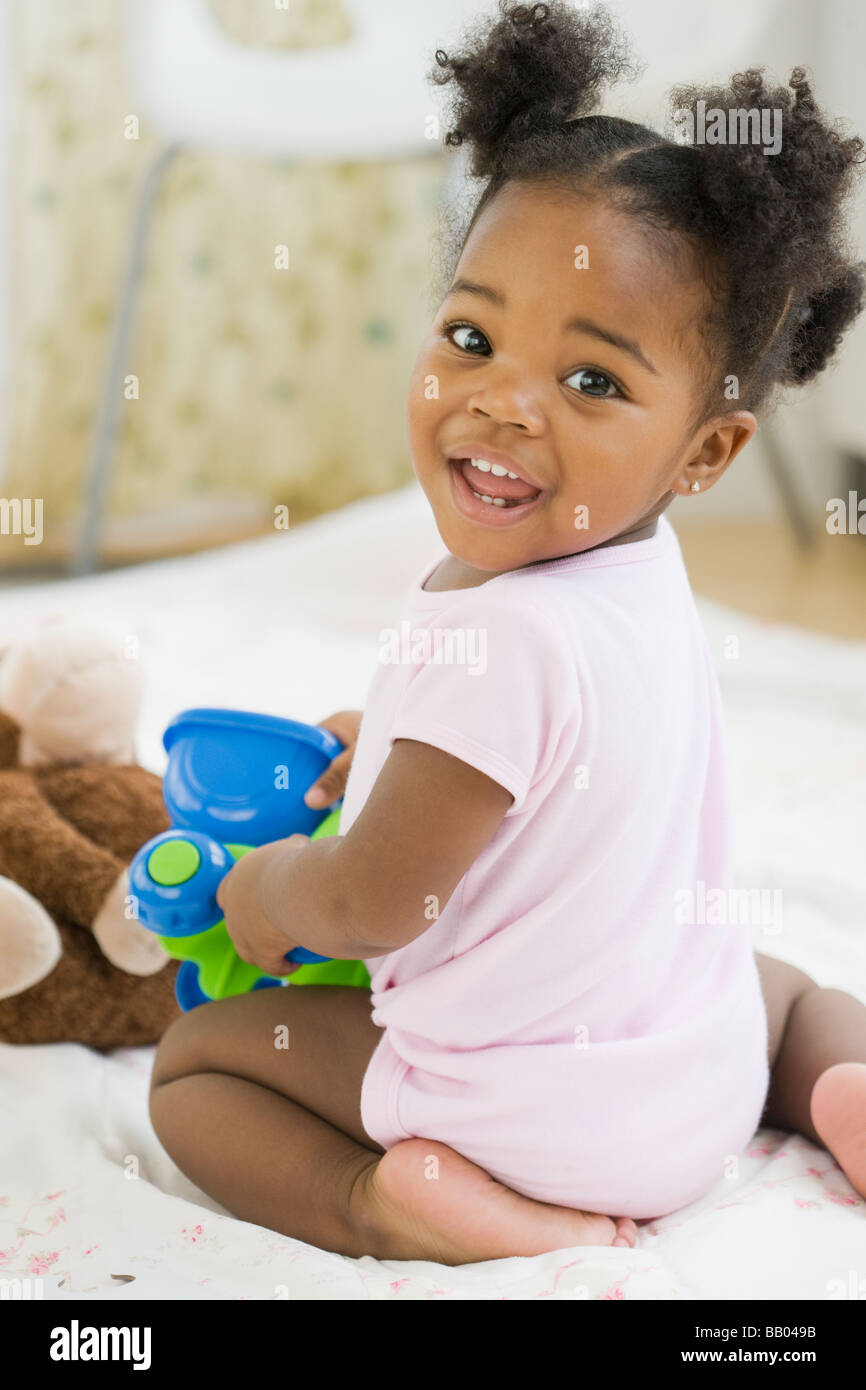 African baby playing with color toy hi res stock photography and images Alamy