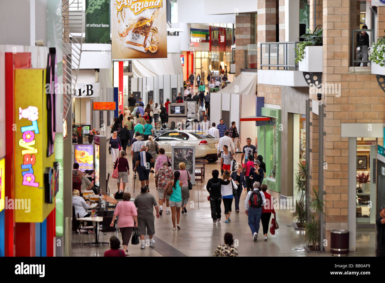 Crowds of shoppers in a modern shopping centre Stock Photo