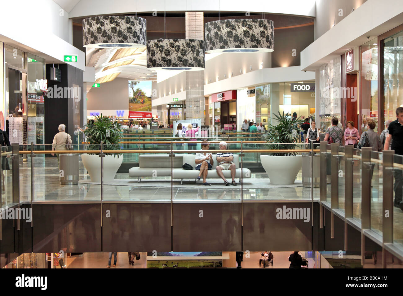 Crowds of shoppers in a modern shopping centre Stock Photo