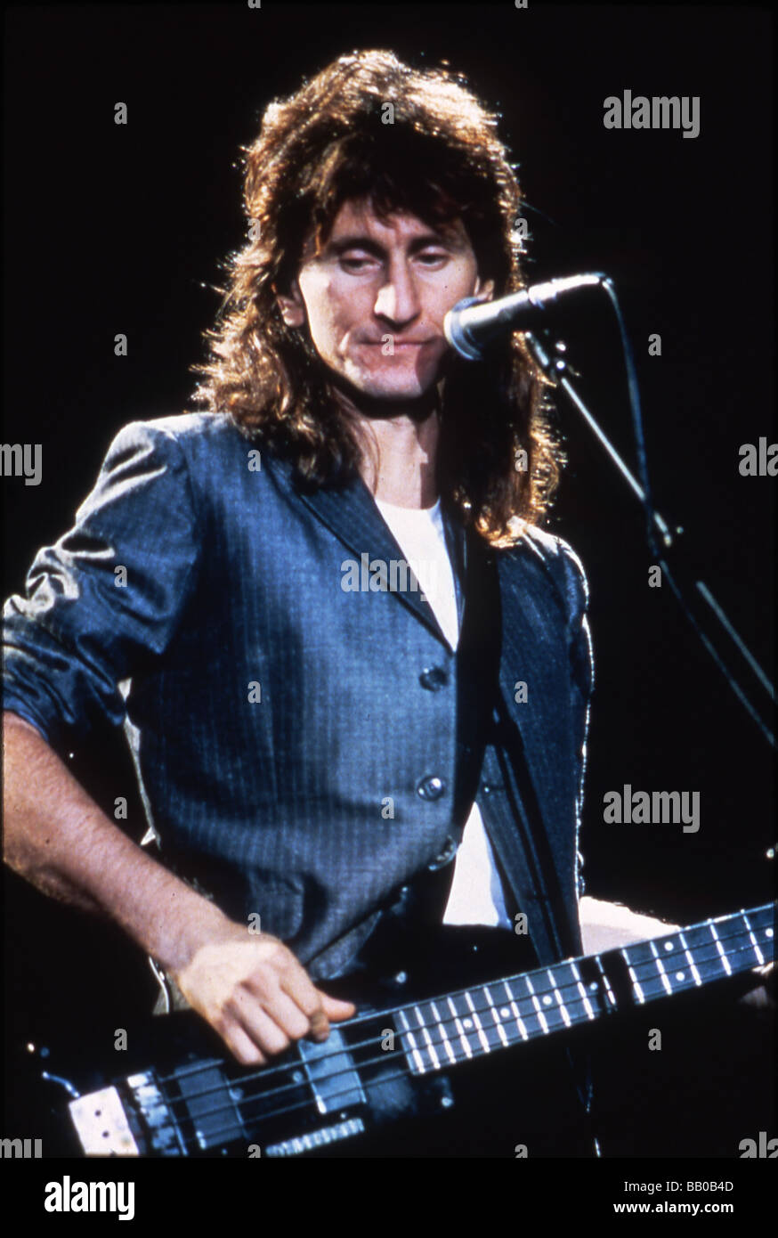 RUSH US rock group with bass player Geddy Lee about 1982 Stock Photo - Alamy