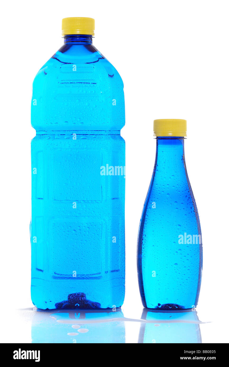 Two bottles of mineral water with droplets reflecting on white background Stock Photo