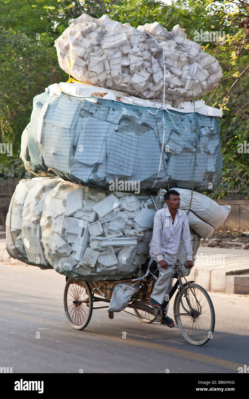 Indian Recycler with a Load of Styrofoam in Delhi India Stock Photo - Alamy