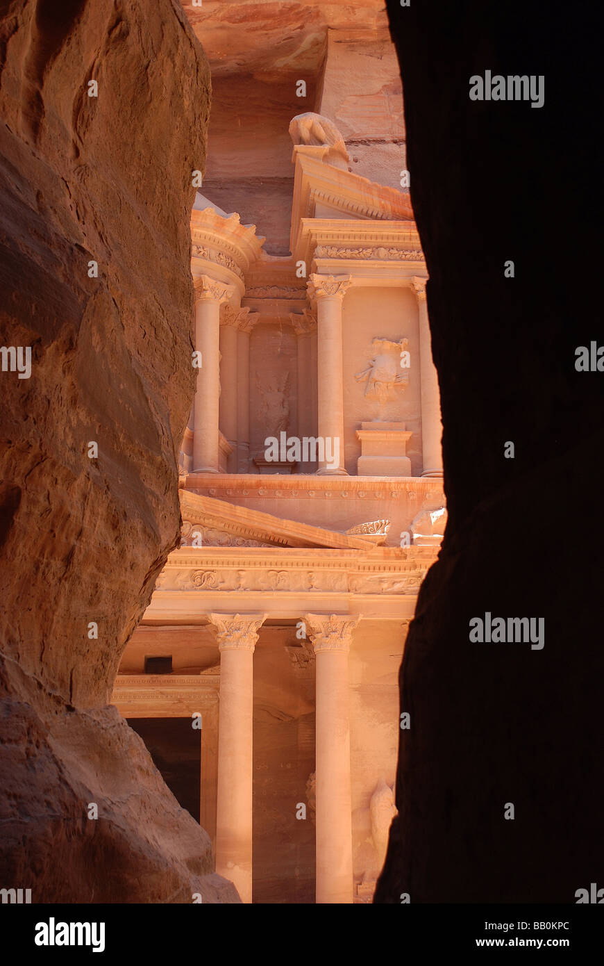 The Rock Cut Nabataean Treasury ( Al Khazneh ) viewed from the Siq , Petra , Jordan Stock Photo