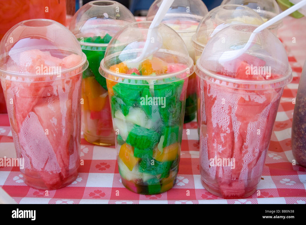 Colorful fruit cups for sale at food concession stands. Hmong Sports