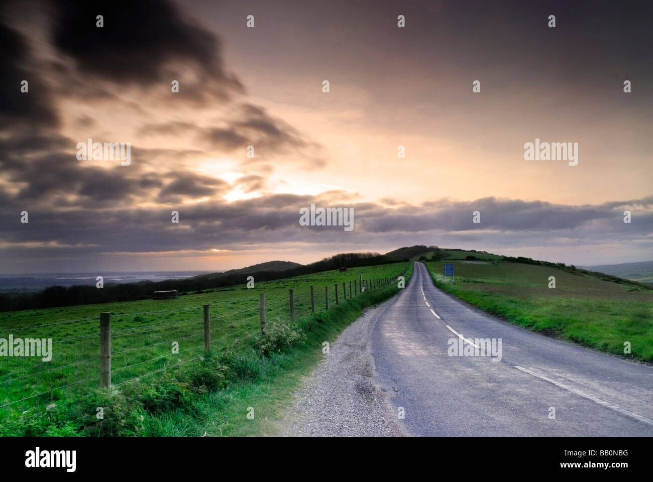 Empty road in the Purbeck hills at dawn Purbeck Dorset England UK Stock Photo