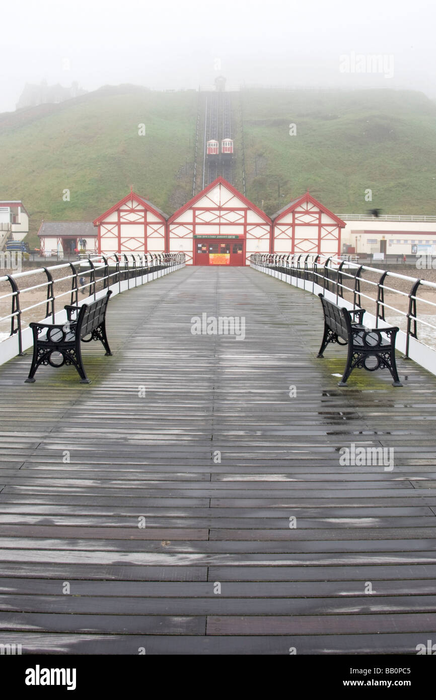 Misty view of victorian pier; Redcar, North Yorkshire, England, UK Stock Photo