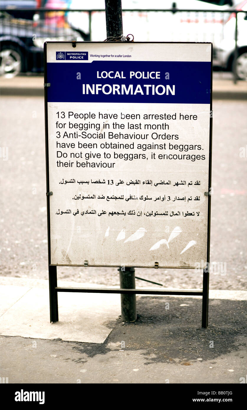 Police sign concerning beggars in Edgware Road, London, England, UK Stock Photo