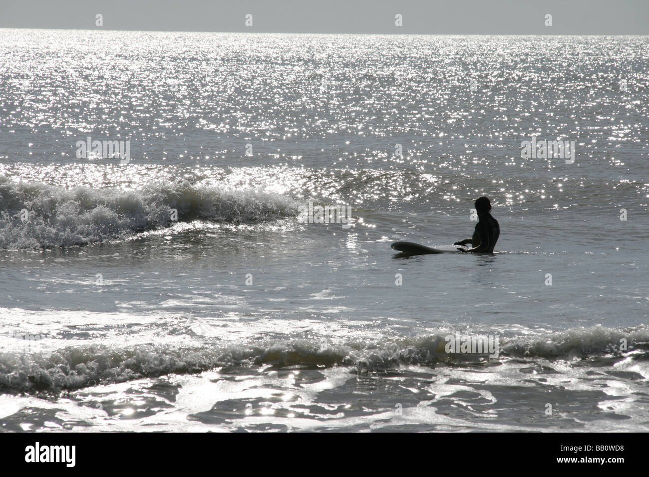 Riding surfer wearing wetsuit hi-res stock photography and images - Alamy