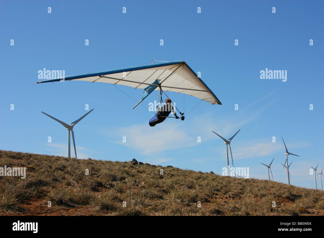 A hang glider banks to the left  in south Australia Stock Photo