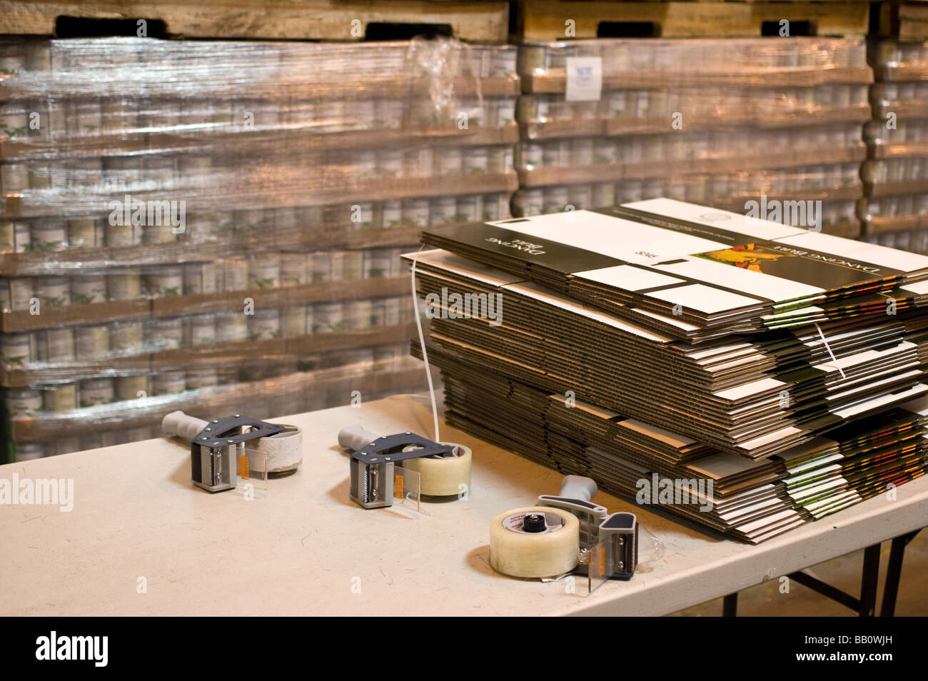 Boxes and tape used to pack food stuff; the warehouse of the California