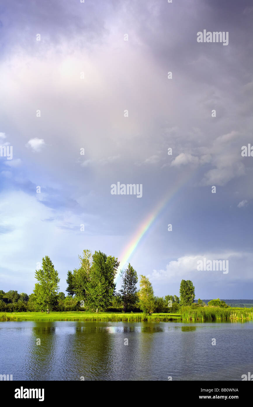 Rainbow and a passing thunderstorm, Grand Beach Provincial Park
