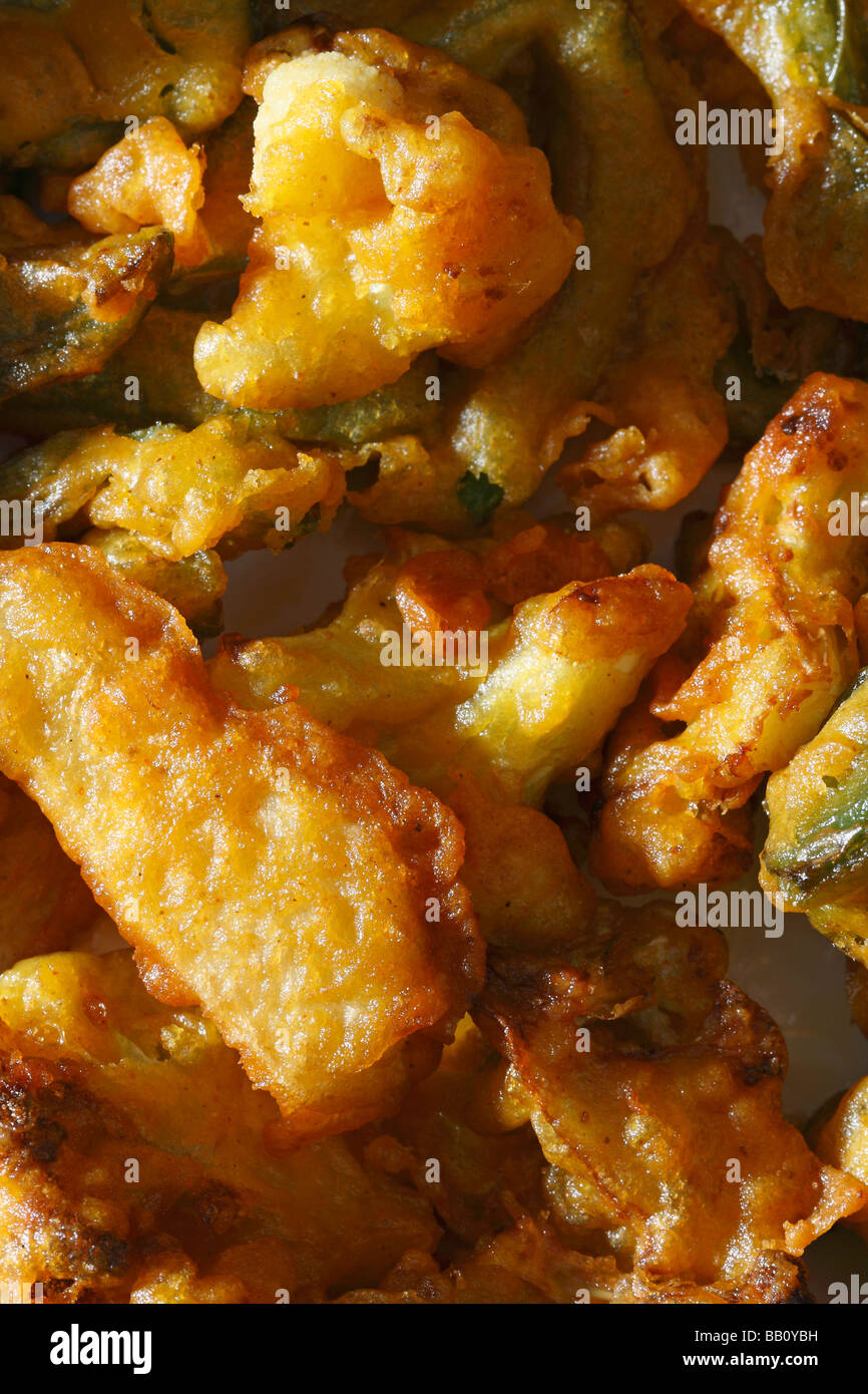 Vegetable Fritters is a snack which is made from vegetables dipped in a