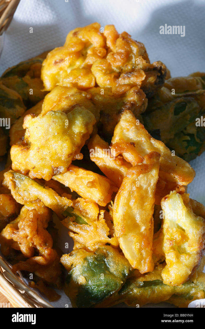 Vegetable Fritters is a snack which is made from vegetables dipped in a