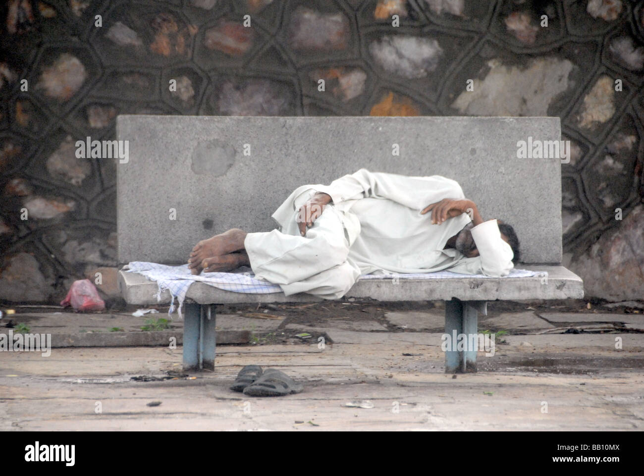Sleeping man Jaipur station Rajasthan India Stock Photo