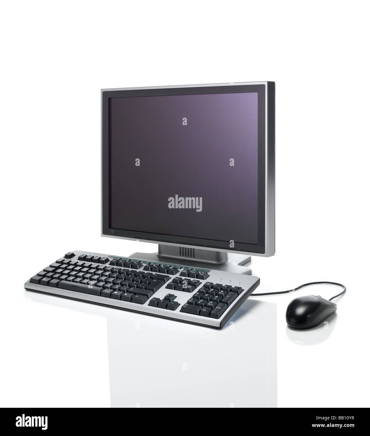 A computer keyboard, mouse and Flat monitor Stock Photo
