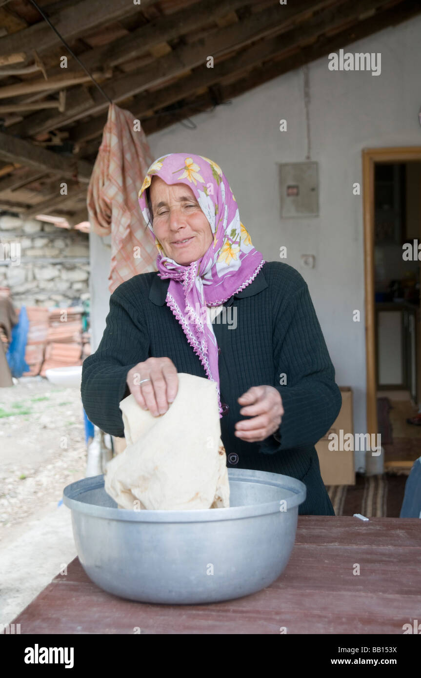 Turkey Antalya Koprulu River Canyon The small village of Selge Local woman preparing pita bread Stock Photo