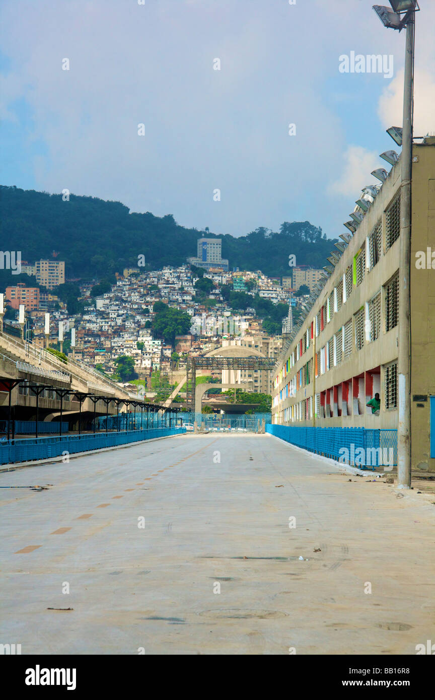 Empty Sambodromo carnaval street in Rio de Janeiro with Morro da Coroa favela in the background Stock Photo