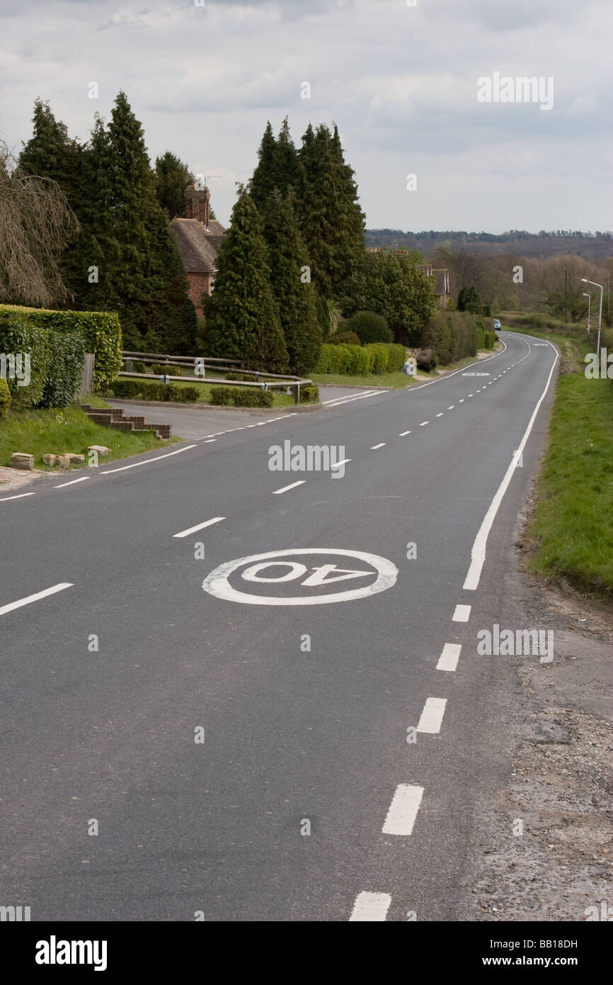 40mph speed limit sign painted on the road surface on a country lane
