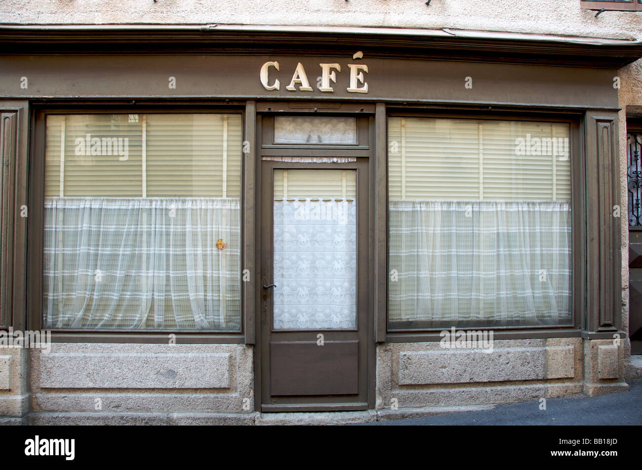 Old fashioned closed down French cafe Stock Photo