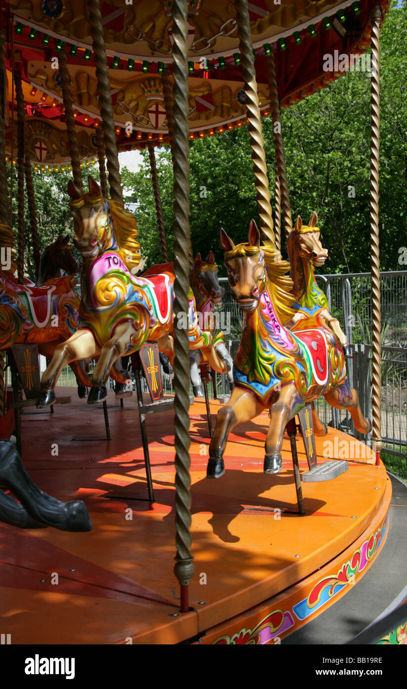A Carousel or Merry-go-round on the South Bank of the River Thames, London, UK Stock Photo